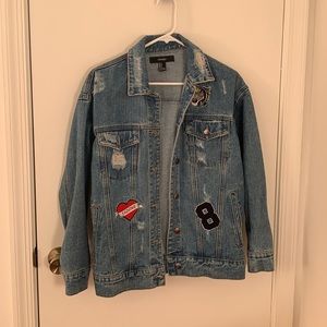 Forever 21 Denim Jean Jacket Size Small Blue with Patches and Rips.